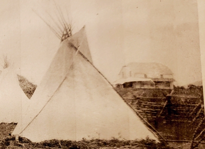 early photo of Star House with tipis outside